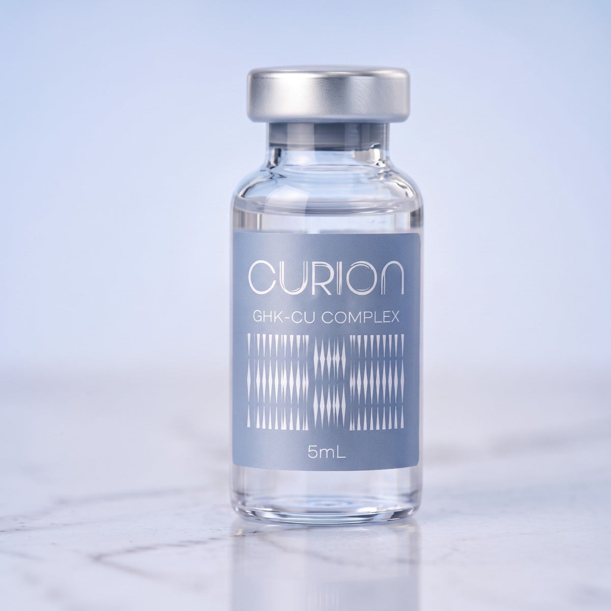 DIY Skincare Lab™ CURION GHK-Cu bio-revitalizing peptide complex in a 5ml glass vial with a silver cap.