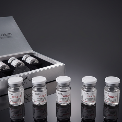 DIY Skincare Lab™ MeToo Healer PDRN Boost CH No. 10 vials and open product box on a reflective grey surface.