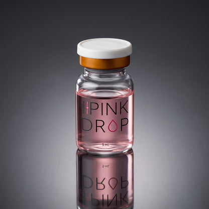 DIY Skincare Lab™ Pink Drop radiant skin booster in a 5ml glass vial with a soft pink vitamin B12 serum formula.