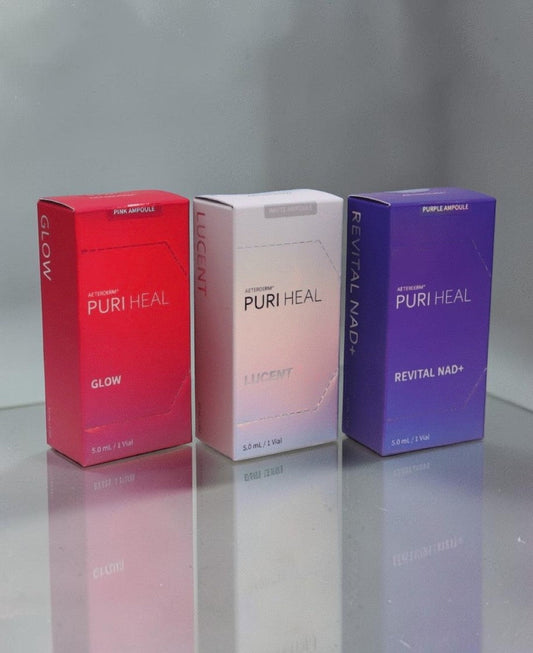 DIY Skincare Lab™ PURI Heal Perfect Trio set featuring pink, white, and purple 5ml ampoule boxes for skin rejuvenation.