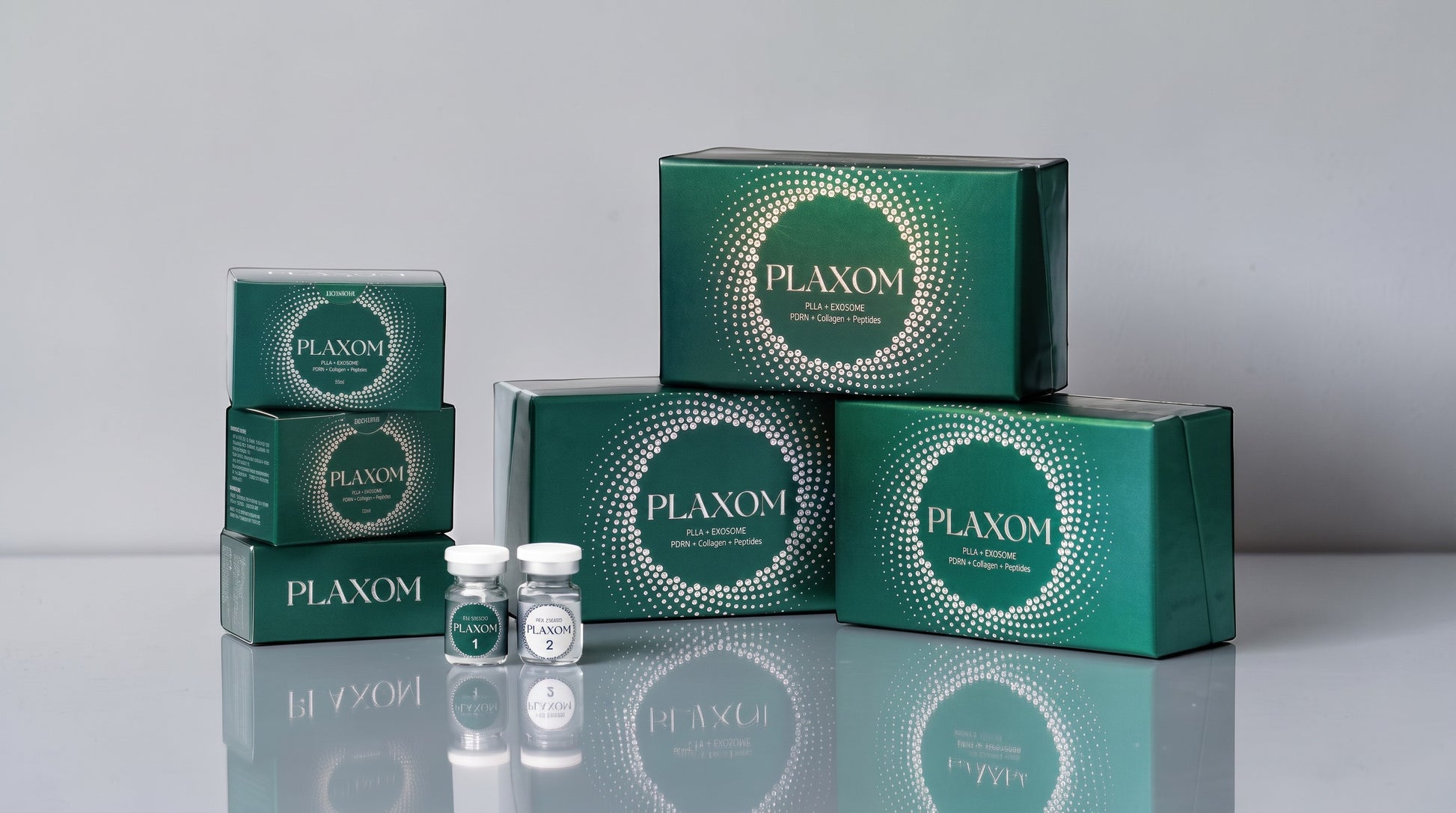 DIY Skincare Lab™ Selastin Plaxom dermal rejuvenation set with green boxes and two vials for skin revitalization.