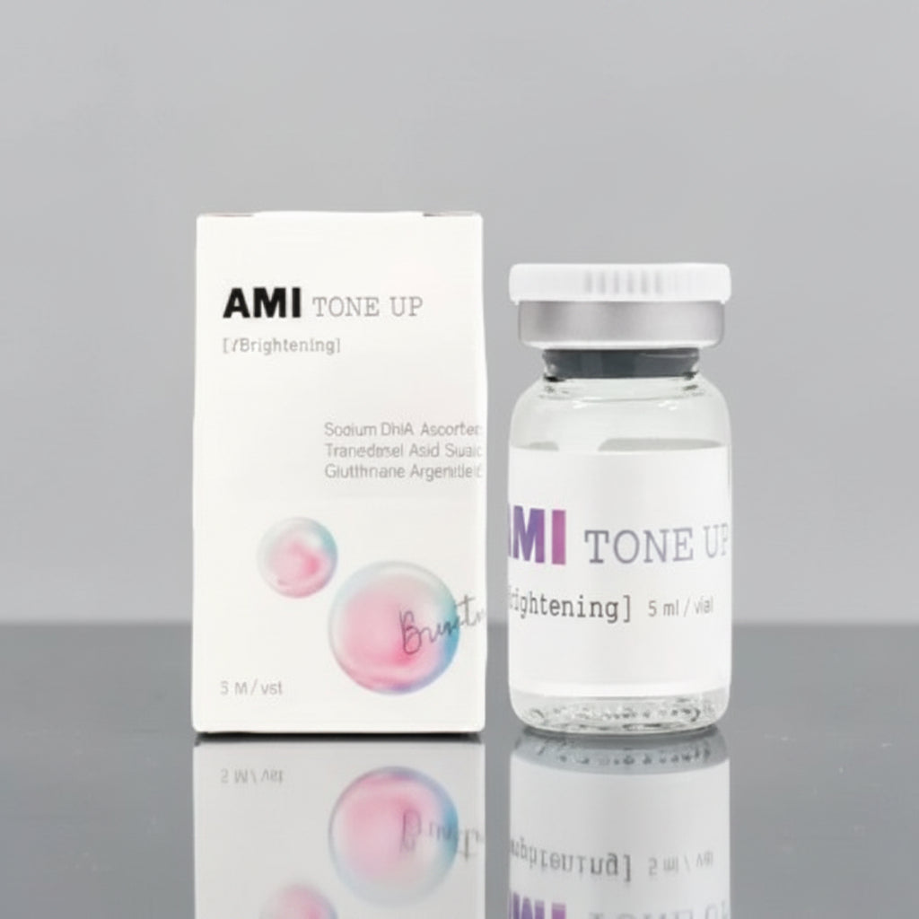 AMTone Up skincare product packaging on a reflective surface with a gray background
